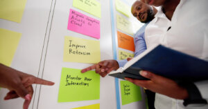 Product owner discusses deadlines with a UX designer