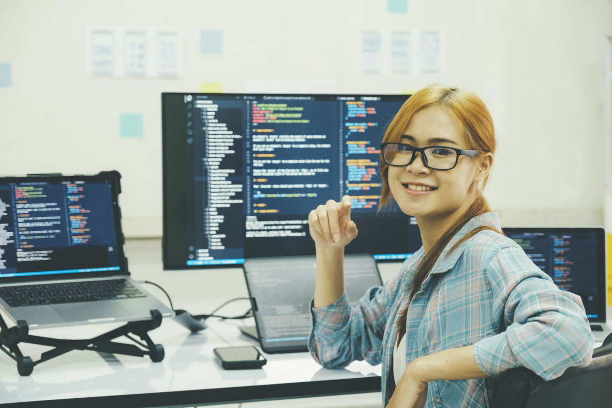 Visual Design for UX Training- designer pauses at monitor