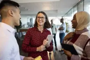 diverse colleagues stop to discuss inclusive design