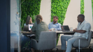 sustainability ux meeting people sit and discuss