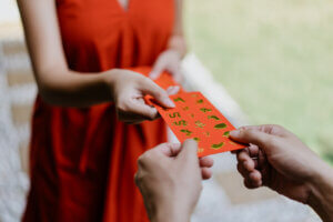 red envelope exchange illustrating an important cross-cultural design criteria