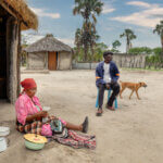 african villagers interviewed by white male ux researcher.jpg