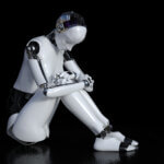 3D robot sitting in solitude on the floor and looking sad or depressed. Black background.